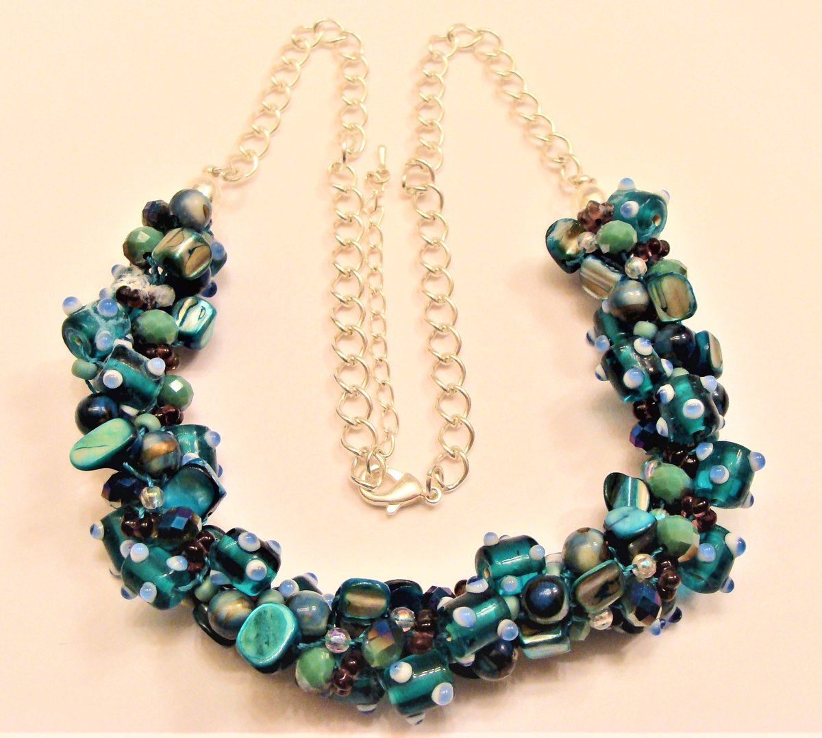 girliegals12's tweet photo. Teal Blue Bumpy Lampwork Beads, Mother Of Pearl Shell Beads, Crystal Kumihimo Necklace: https://t.co/BO1aFvzCzg... #tealblue #chunkynecklace #shellbead #motherofpearl #crystals #beadedjewelry #kumihimo #handmadejewelry #sparkly #FreeShipping #Boho #hippie #OOAK #giftforher #etsy https://t.co/AlYlmEMAtK