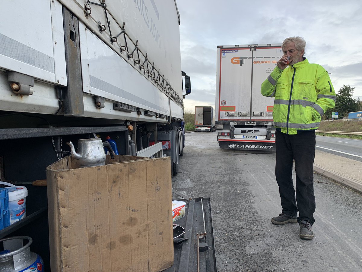 Hamid. En route back to Istanbul from Leeds. Brewing Turkish tea at the side of the road. He’s not in the Port of Dover. Or Manston Airfield. He’s in one of the many lay-bys in Kent.