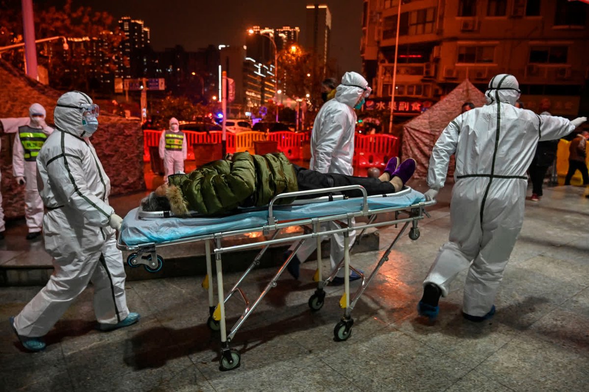 - January 25 -Medical staff members bring a patient to the Red Cross hospital in Wuhan, China.Cases of pneumonia detected in the city were first reported to WHO on December 31, 2019, before the coronavirus was known.  https://cnn.it/3lXJBdf 