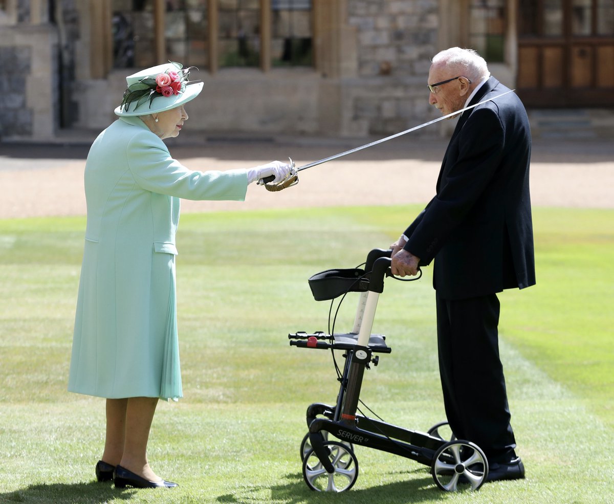 Captain Sir Thomas Moore receiving his knighthood from Queen Elizabeth II during a ceremony at Windsor Castle  @chrisJack_Getty