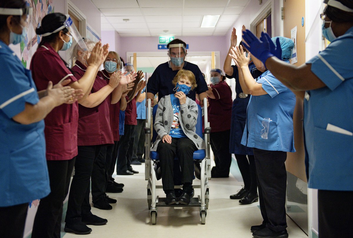 Margaret Keenan, 90, applauded by staff as she returned to her ward after she became the first person in the United Kingdom to receive the Pfizer/BioNtech covid-19 vaccine at University Hospital, Coventry  @PA Jacob King