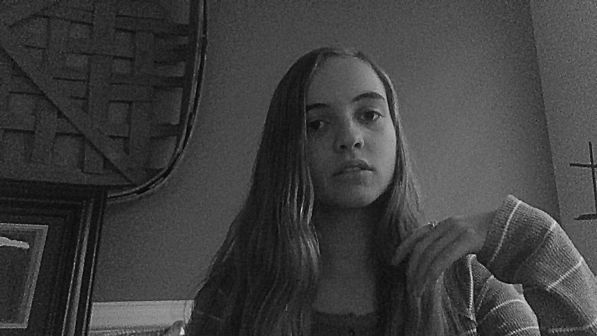 Turning up the clarity to 100, why are there weird white outlines around them? For refrence, I turned one of my own pictures b&w then pushed the clarity up to 100, you see no weird outlines on mine, idk if this is photoshop fail, I thought I might point it out tho.