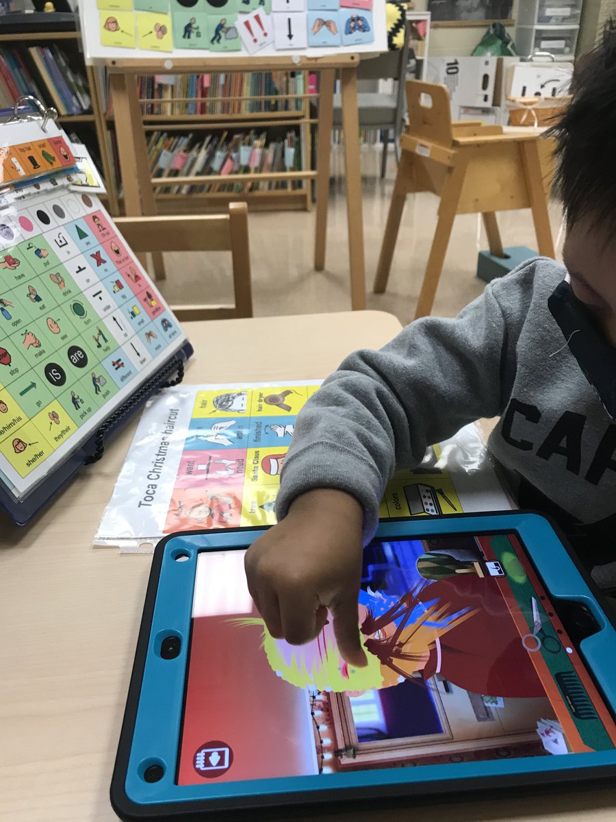 Using a core book and specific visual support to give Santa a haircut and color.  Ho Ho Ho! #CHPROUD