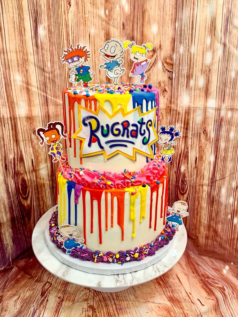 A baby’s gotta do what a baby’s gotta do! 🤍
•
Rugrats two tier cake! Such a fun cake!