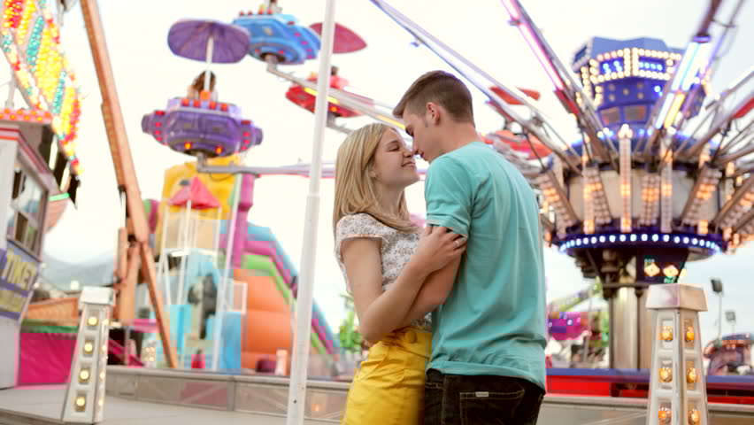 The words relay the story of two children in a grown up world. The inclusion of innocent / adolescent imagery such as the merry-go-round & ferris wheel paints the picture a coming of age story. A universally relatable tale of a young couple finding love for the first time.