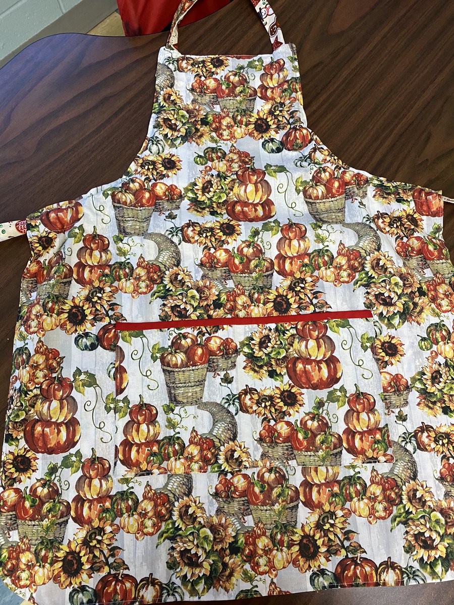 MissRose3rd's tweet photo. A student’s grandma made this amazing apron for me. I already got to put it to use working on our traditional Christmas dinner prep! ❤️🎄 https://t.co/lUxwBUDaQo