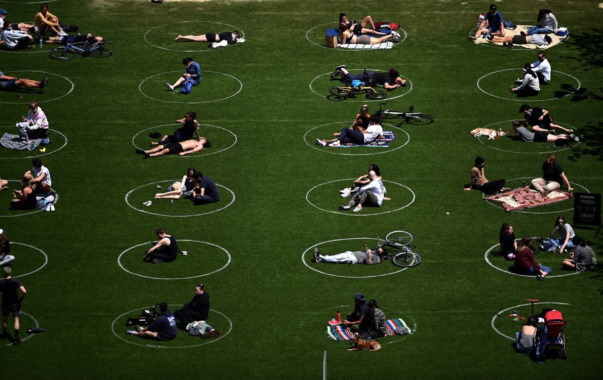 - May 17 -People sit in New York’s Domino Park. The painted circles, spaced six feet apart, encouraged social distancing.  https://cnn.it/3lXJBdf 