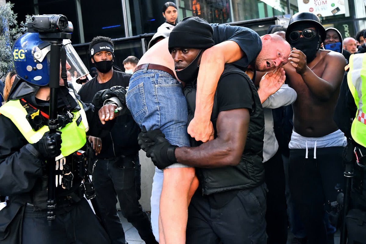 - June 13 -Patrick Hutchinson carries an injured man — who was allegedly attacked amid violent clashes — to safety during a Black Lives Matter protest in London.  https://cnn.it/3lXJBdf&nbsp;