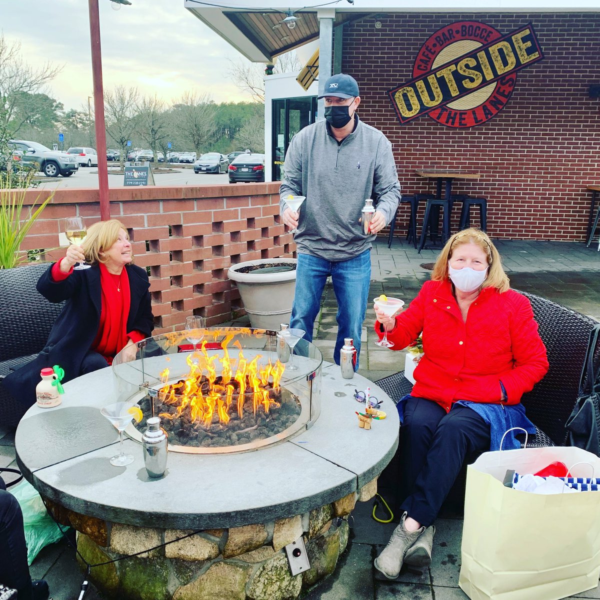 Beautiful day for sitting by the fire pit and taking a break from that last minute shopping #mashpeecommons #mashpeebowling #lanesbowlandbistro #lastminuteshopping