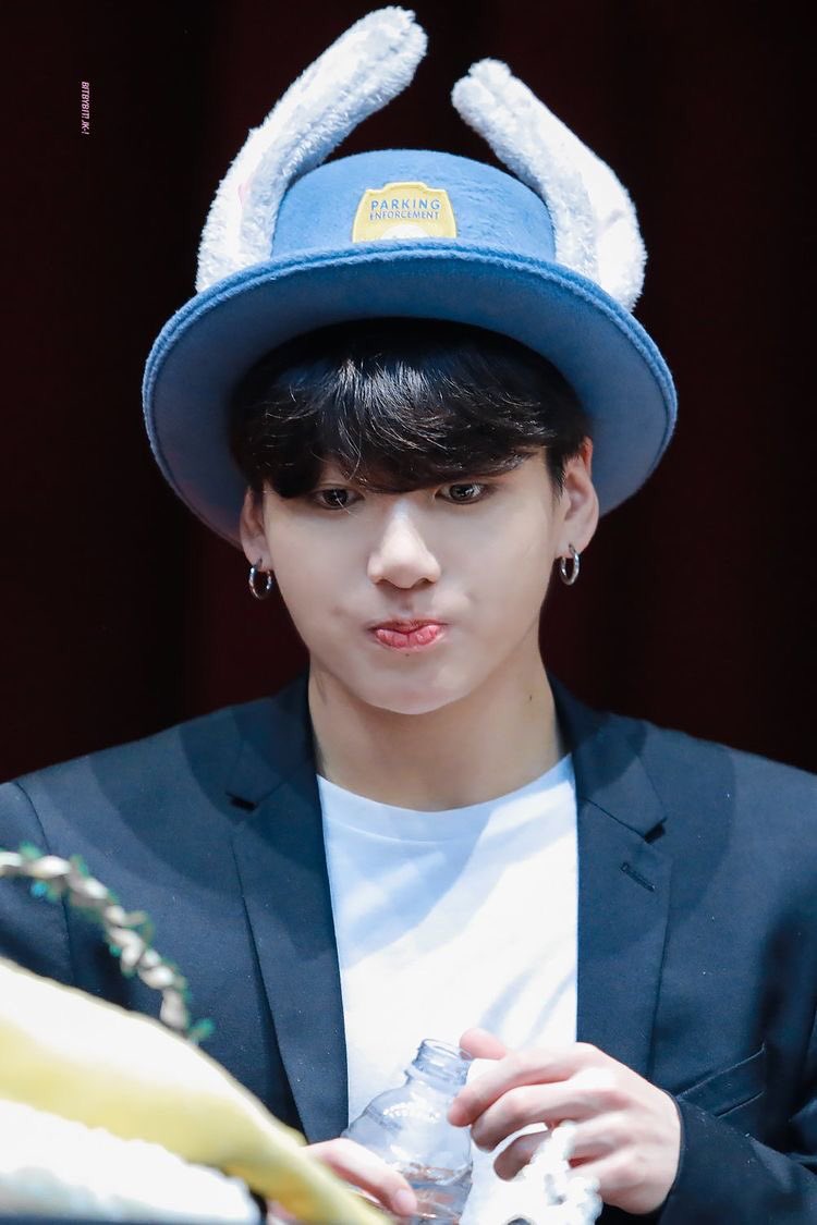 Jungkook looking the cutest in head wear-A thread;