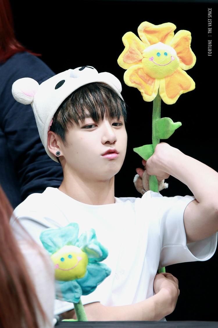 Jungkook looking the cutest in head wear-A thread;