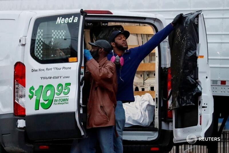Refrigerated, and sometimes not refrigerated, makeshift morgues were documented outside hospitals and funeral homes across New York.Photos by  @Lucas_Jackson_ and Brendan McDermid