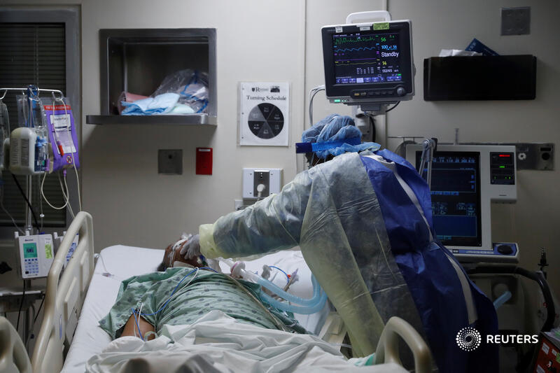 On the South Side of Chicago in April, Shannon Stapleton photographed registered nurse Paula Johnson inside the intensive care unit of Roseland Community Hospital