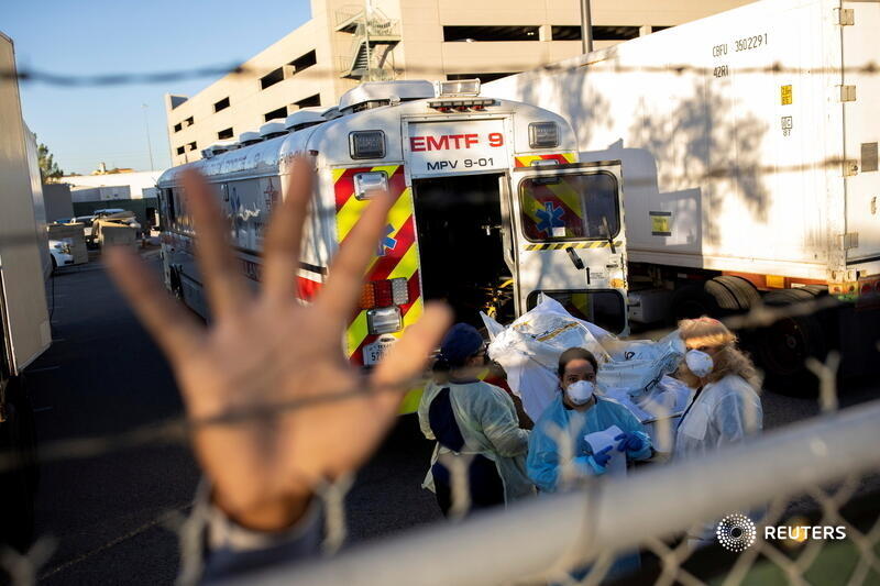 Here, an El Paso County Sheriff's Officer tries to block photographs from being taken as bodies are moved to refrigerated trailers.Photo by  @i_p_a_1 Full story:  https://www.reuters.com/article/us-health-coronavirus-usa-texas/el-paso-texas-calls-in-ten-morgue-trucks-as-coronavirus-cases-surge-idUSKBN27P2VY