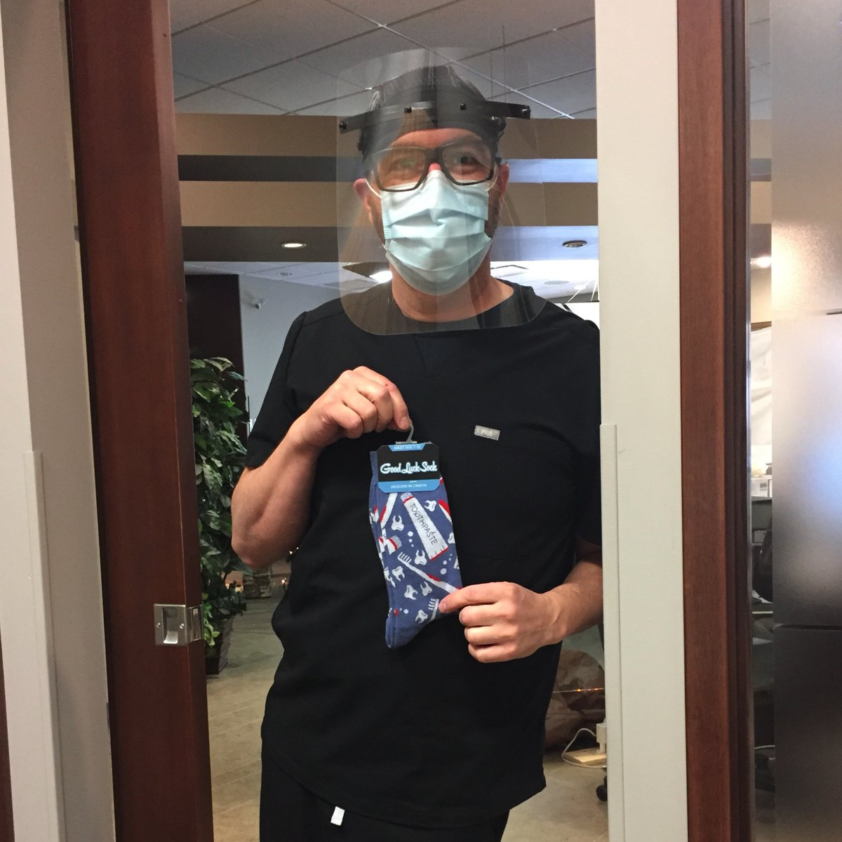 SignatureOrtho's tweet photo. Thank you so much to all of the patients and dental offices who thought of us this holiday season! Check out these perfectly suited dental socks that Dr. Russett was gifted! 🦷🪥 https://t.co/dJQ9vCH7q4