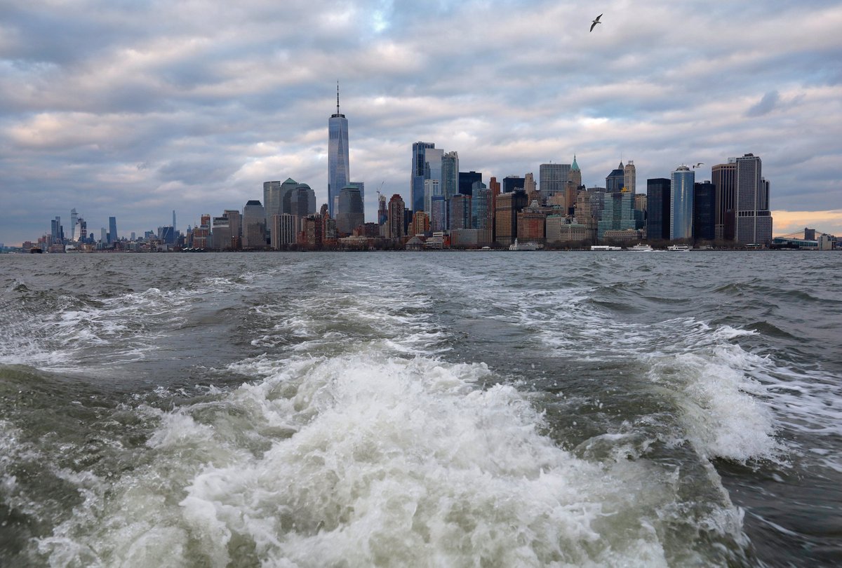 GaryHershorn's tweet photo. Leaving lower Manhattan in the wake from a New York Media Boat heading to the Statue of Liberty at sunset in New York City #NewYork #newyorkcity #nyc @NYmediaBoat #nymb #sunset @agreatbigcity https://t.co/5RgLnOsdJF