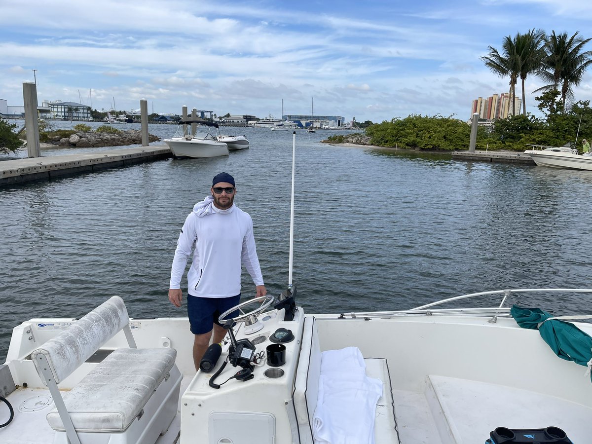 CoachRidings's tweet photo. Thanks for taking @natpcal and I out on the boat today @KUCoachVach! Fun checking out Peanut Island! #DecemberInFL https://t.co/uZvR1CmGGb