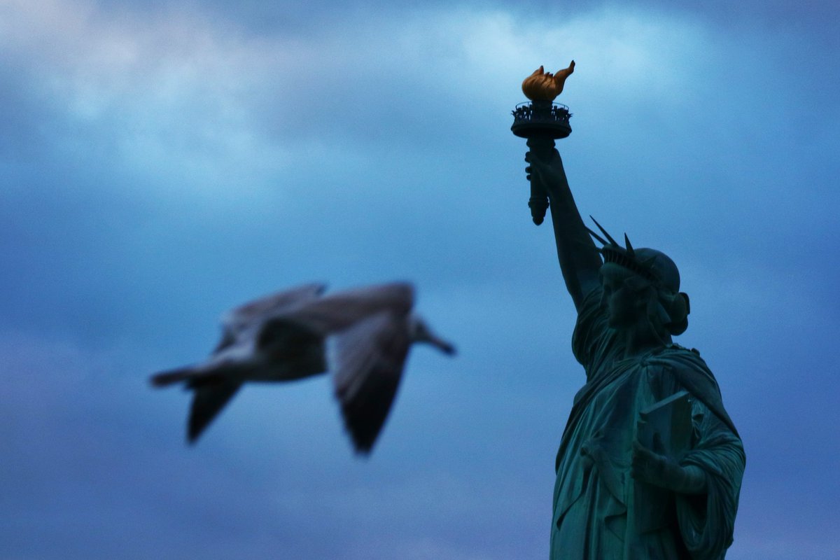 GaryHershorn's tweet photo. A trip around the Statue of Liberty with New York Media Boat as the sun set in New York City tonight #newyorkcity #nyc #newyork @NYmediaBoat #nymb @statueellisnps @agreatbigcity https://t.co/CO4gcmdCNw