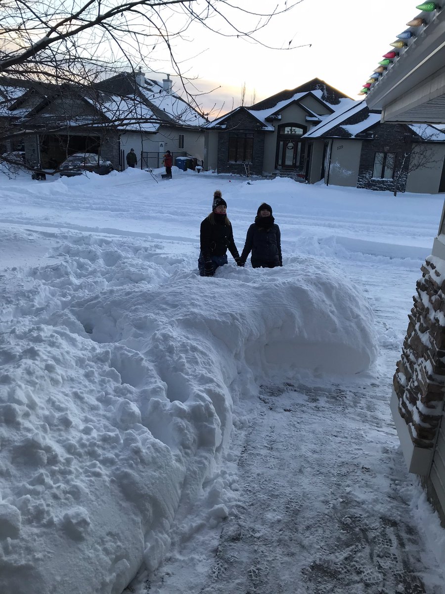 Meanwhile in Canada....took me over 2 hours to dig out! At least teenagers can still have fun in the snow!