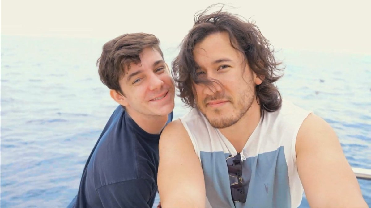 ethan and mark smiling/ laughing with each other a thread