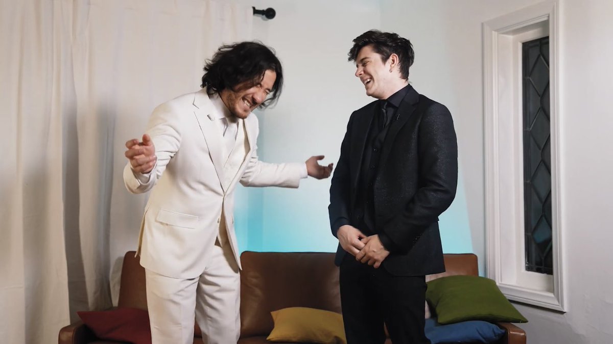 ethan and mark smiling/ laughing with each other a thread