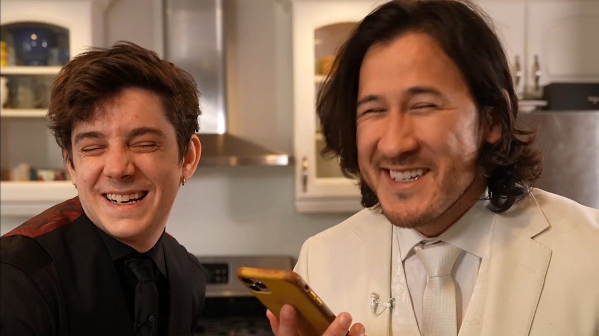 ethan and mark smiling/ laughing with each other a thread