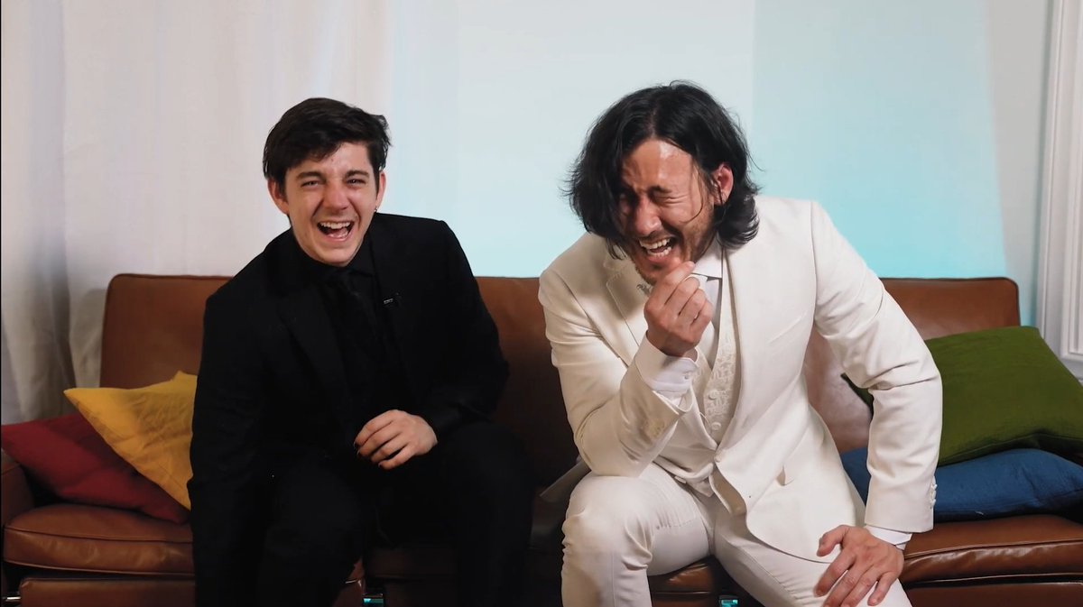 ethan and mark smiling/ laughing with each other a thread