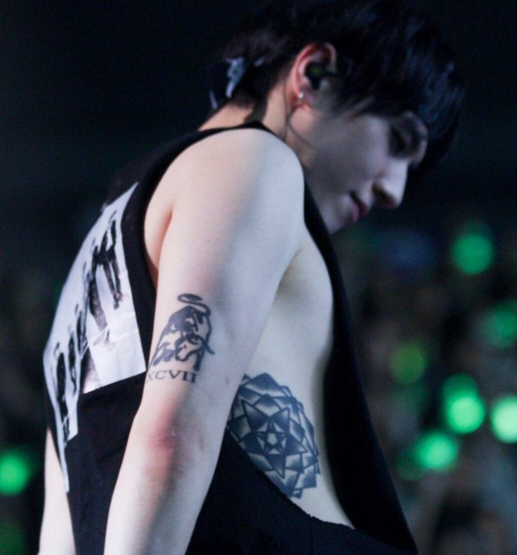 We have yet to see a clear photo of Youngjae's abdominal tattoo(?)