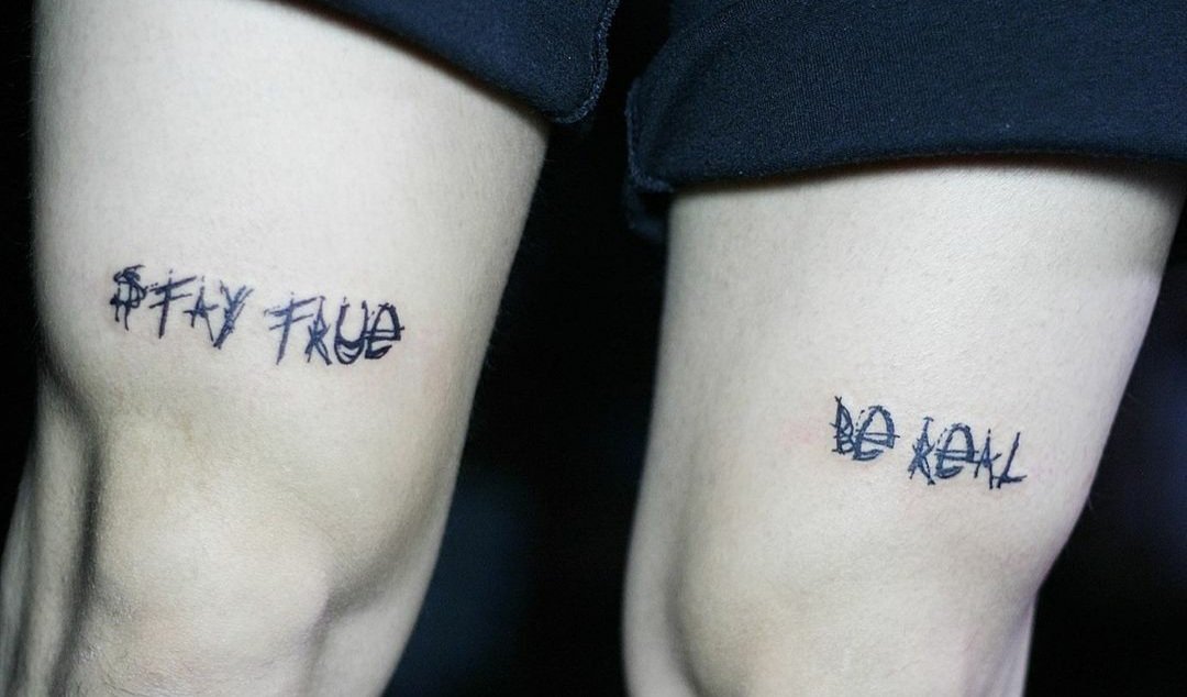 Mark's thigh tattoos