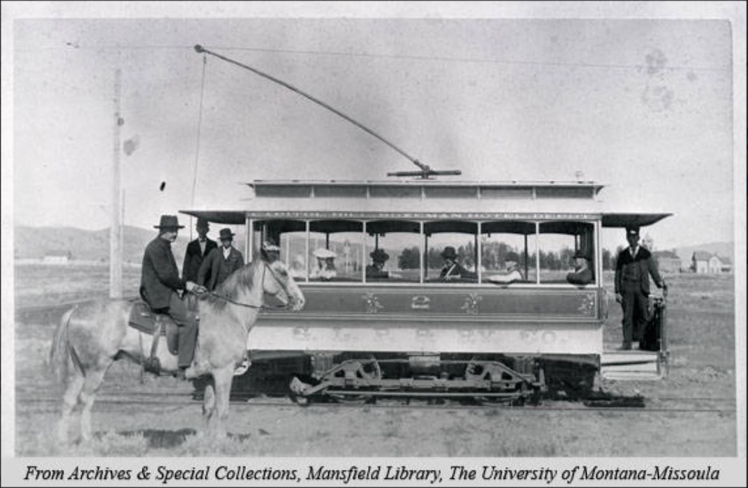 Bozeman streetcar. Bozeman, Montana, streetcar number 2 of the G.L.P. &amp; Railway Company. The side of the car reads 'Capitol Hill, Bozeman Hotel, Depot.'  Conductor stands at doorway of streetcar on the right. #mthistory #montana #history  buff.ly/3mklPbK