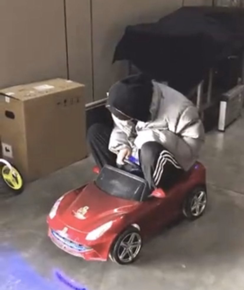 There goes my 3 yr old babie to school on his littol car