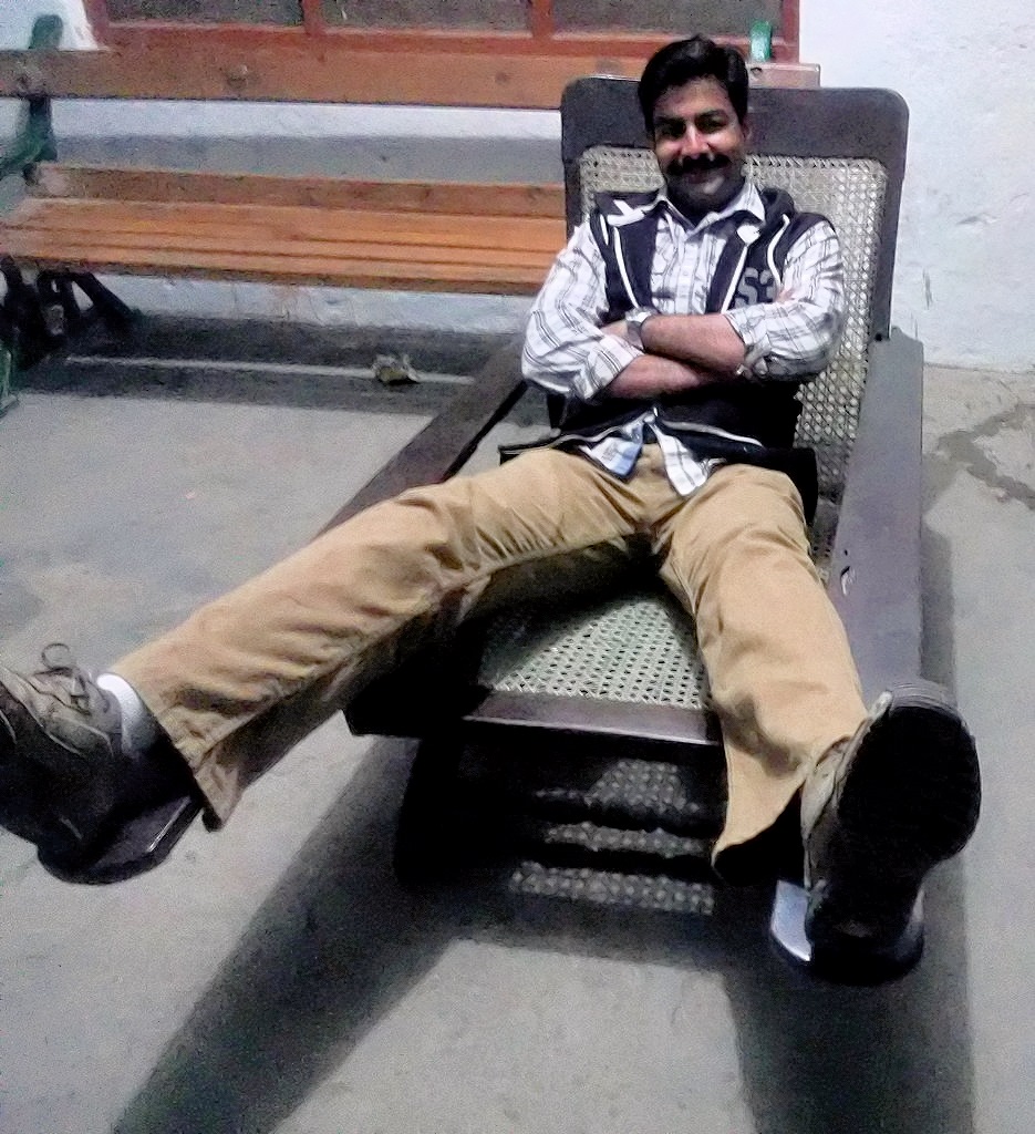 On a cold December evening at Kot Lakhpat Railway Station in Station Master's office I reclined into a siesta with both legs spread out, one leg extended on each footrest of our Chair, Long Arm a.k.a Planter's Chair a.k.a Bombay Fornicator