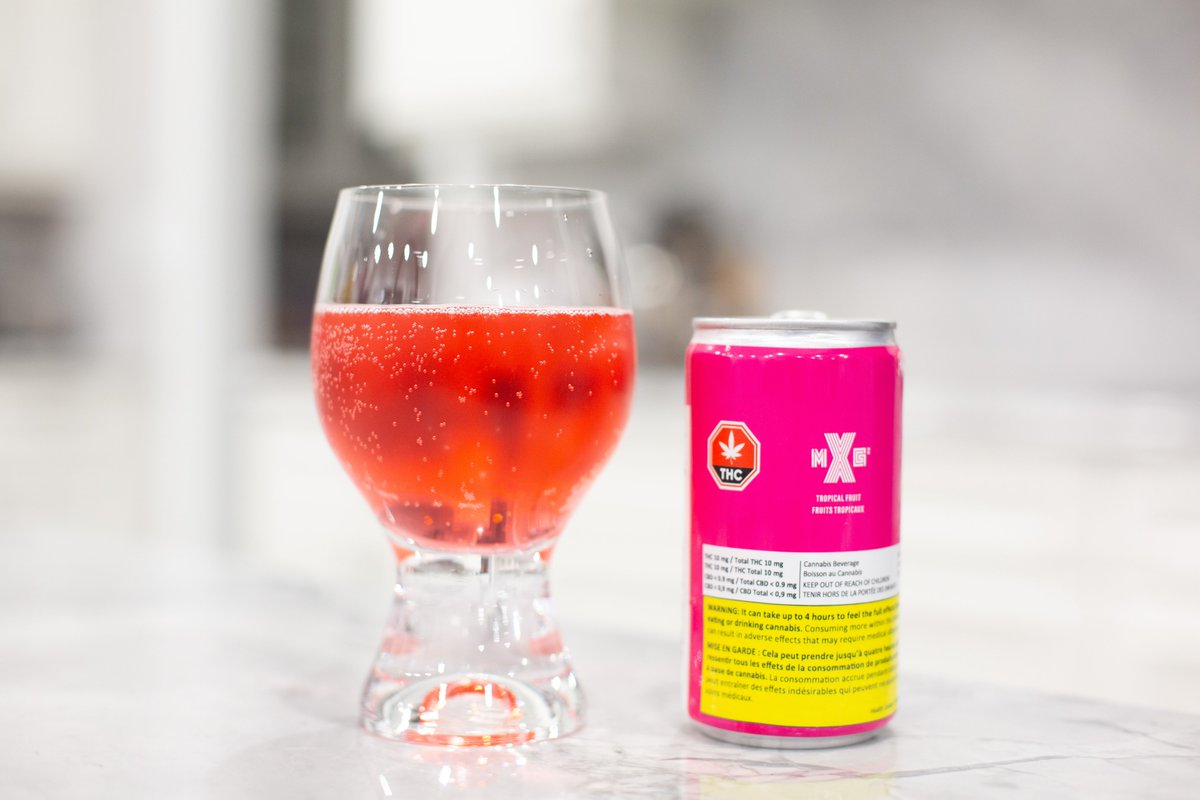 When poured into a glass, it looks like a very rich,  #tropical- #fruity color with bubbles. Kinda reminds of a  @Koolaid  #tropical  #Punch actually - although  #Koolaid has a deeper red -  #XMG has a lighter, almost  #rose  #red color with  #fizzy.