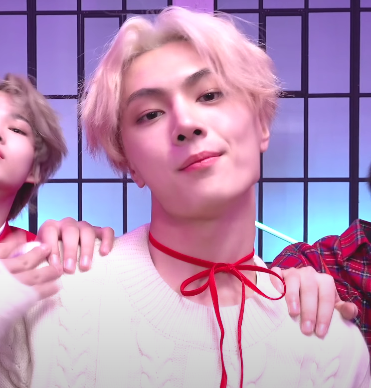 there's something about jay and sunghoon having their chins up while looking down