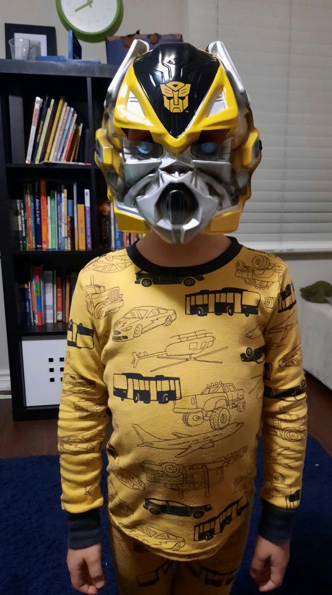 SharkawyMD's tweet photo. After I got home last night my little guy wanted to remind me to stay vigilant. So much so that this masked man decided to go to bed in his armor. What can I say. Too much of a good thing? 🤷♂️ #MaskMaster #CovidFreeHoliday https://t.co/YKpwI5yI3p