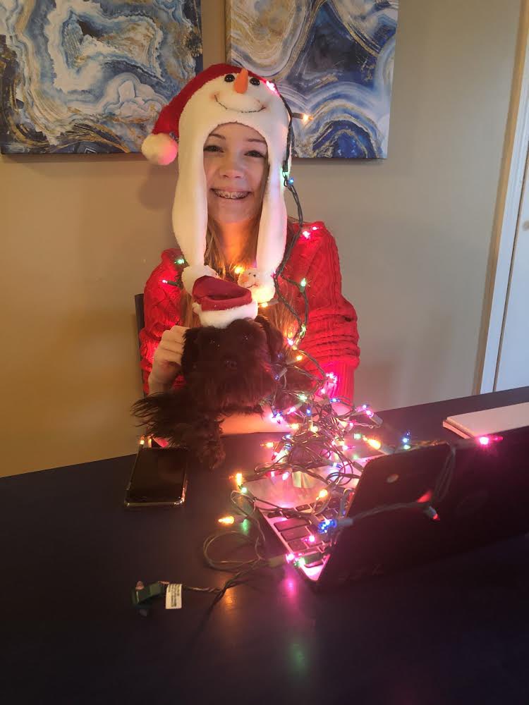 CouncilTms's tweet photo. Julius, Lillah, and Allison (and her puppy) have plenty of holiday spirit!  Great job, everyone! https://t.co/9y5dbwx6Pp