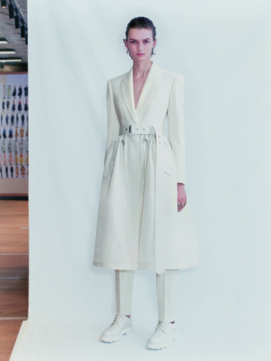 McQueen's tweet photo. An ivory trench frock coat and a deconstructed skirt in ivory microfaille.

Pre-order the #McQueenSS21 collection:
https://t.co/gzcP59oLdS

#McQueenFirstLight https://t.co/ikfjf3jC1Q