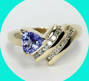 EmpirePawn's tweet photo. Elegant and perfect for a December birthday gift! Trillion tanzanite wave ring in 14K yellow gold with channels of round brilliant diamonds. (.85CT, size 6.5 but we can resize it. #decemberbirthstone #decembergift #christmasgift #tanzanite https://t.co/RfW9rom2LO https://t.co/JgiqY0h4Er