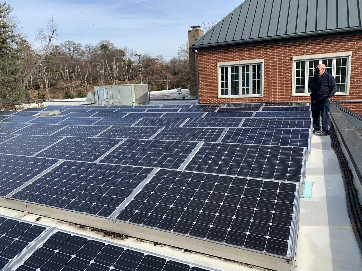 TkPkDeputy's tweet photo. Up on the roof today discussing storage options for solar panels and potential costs of solar panel expansion during new ⁦@takoma⁩ library construction #solarpower #solarenergy https://t.co/3CnpS28Pfn