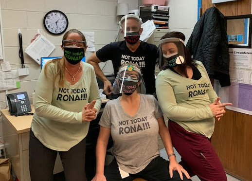 CO_CDHS's tweet photo. Not today, 'rona! Here's the medical team at the Adams Youth Services Center in Brighton posing after receiving their first COVID-19 vaccine shots this week. #COVID19Colorado #NotTodayRona #AdamsAngels https://t.co/f54KiO5uM5