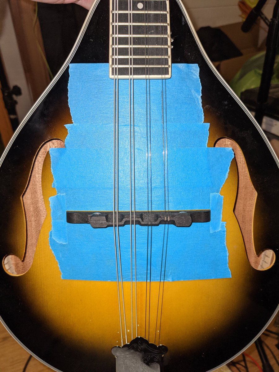 Taped up and outside strings marked to help centring the Pup.....