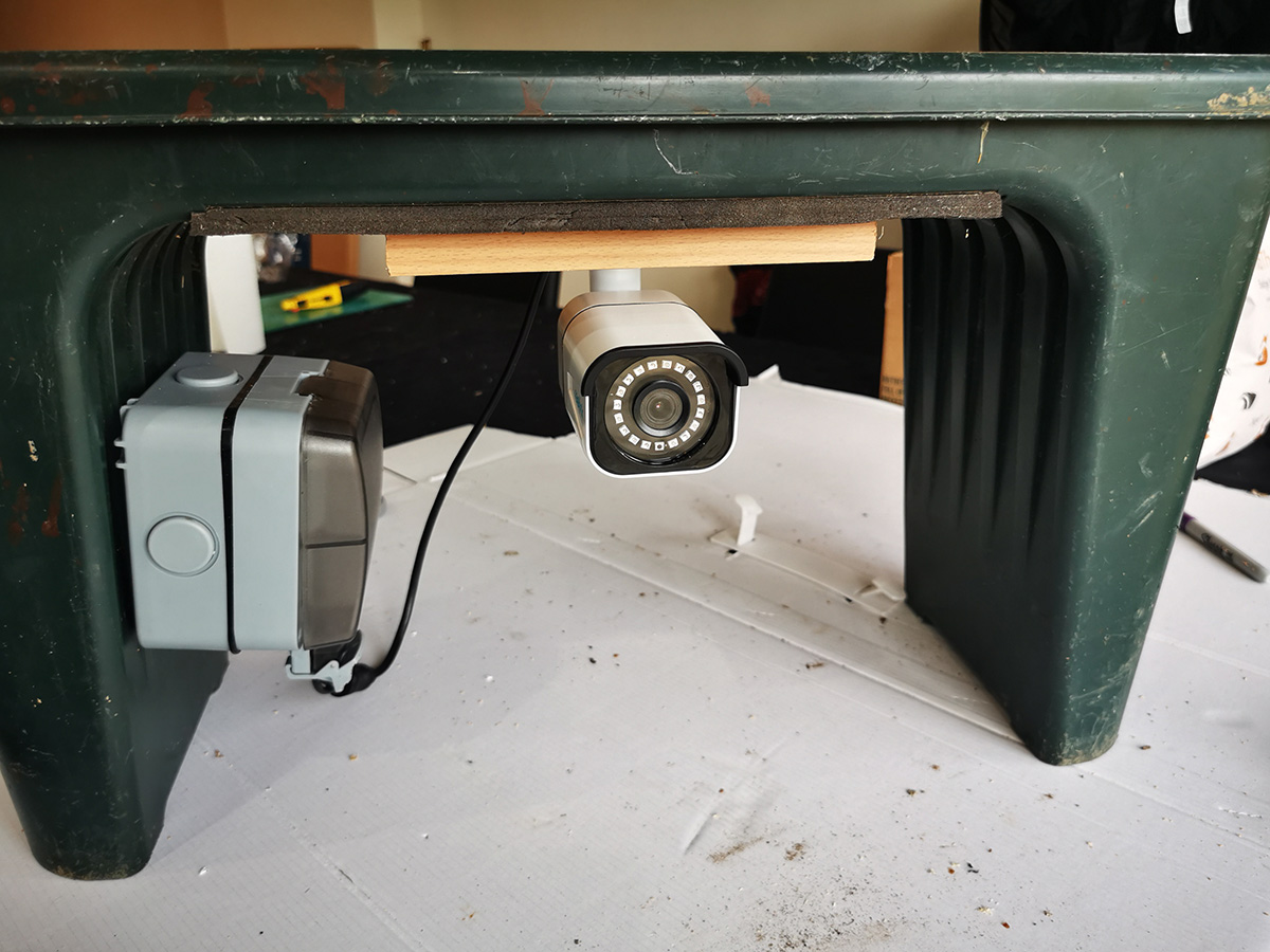 DDayCenter's tweet image. Waterproof enclosure screwed to the side of the garden kneeler and scrap of wood screwed to the underside. @Reolink camera mounted to the wood. Camera is PoE so enclosure is just used to keep network connection dry outside. #reolinkcaptures