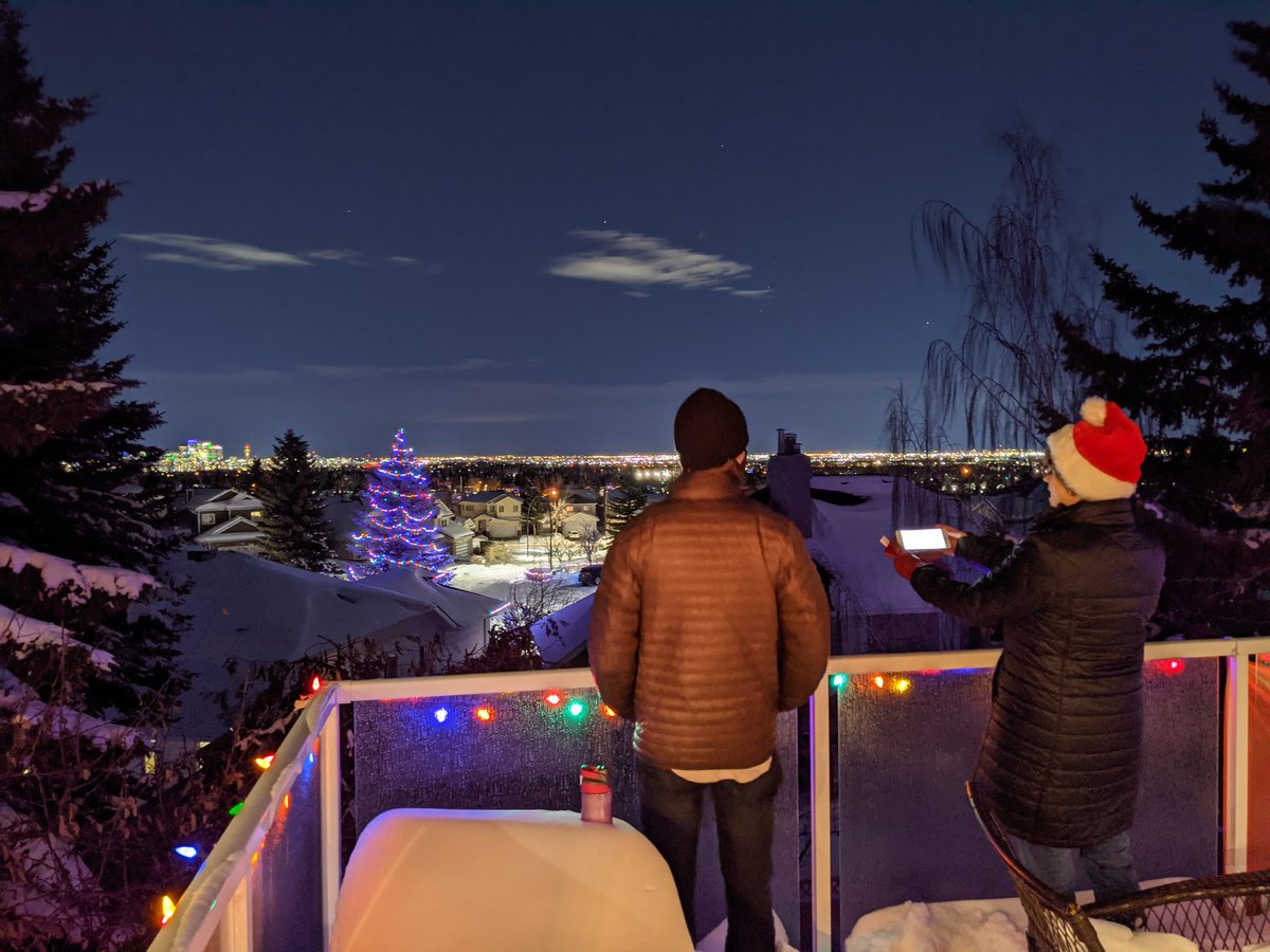 trevornim's tweet photo. My wife and son are belting it out on the deck from signal hill, louder Calgary! #yycholidaysingalong https://t.co/WRiyTOZMFD