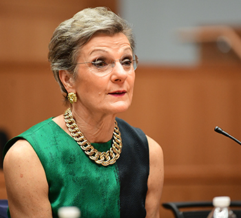 8/ Who is Loretta Preska? Transgender or Transvestite? Are those "S"s around her/his neck?