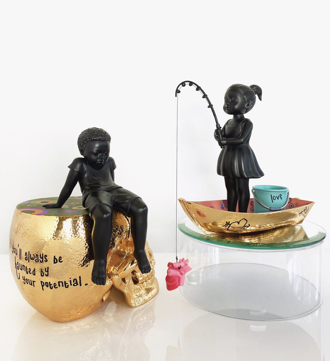 SueTsai's tweet photo. I’m sooo excited to reveal my very first collectible figurines “Reflections” &amp; “The Catch”. These two babies of mine have been in ideation for over two years and in production all this year. They will be my first release of 2021 so stay tuned for details to come in January. 🙌🏼🖤 https://t.co/s8zAGqd53I
