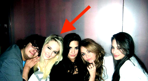 but followers of disney drama quickly devised their own theory as to how the video surfaced, IDing the goading voice behind the camera as that of one of miley's pals - anna oliver, a shadowy fixture in cyrus' disney circle who'd last been at the side of a rehab-bound demi lovato