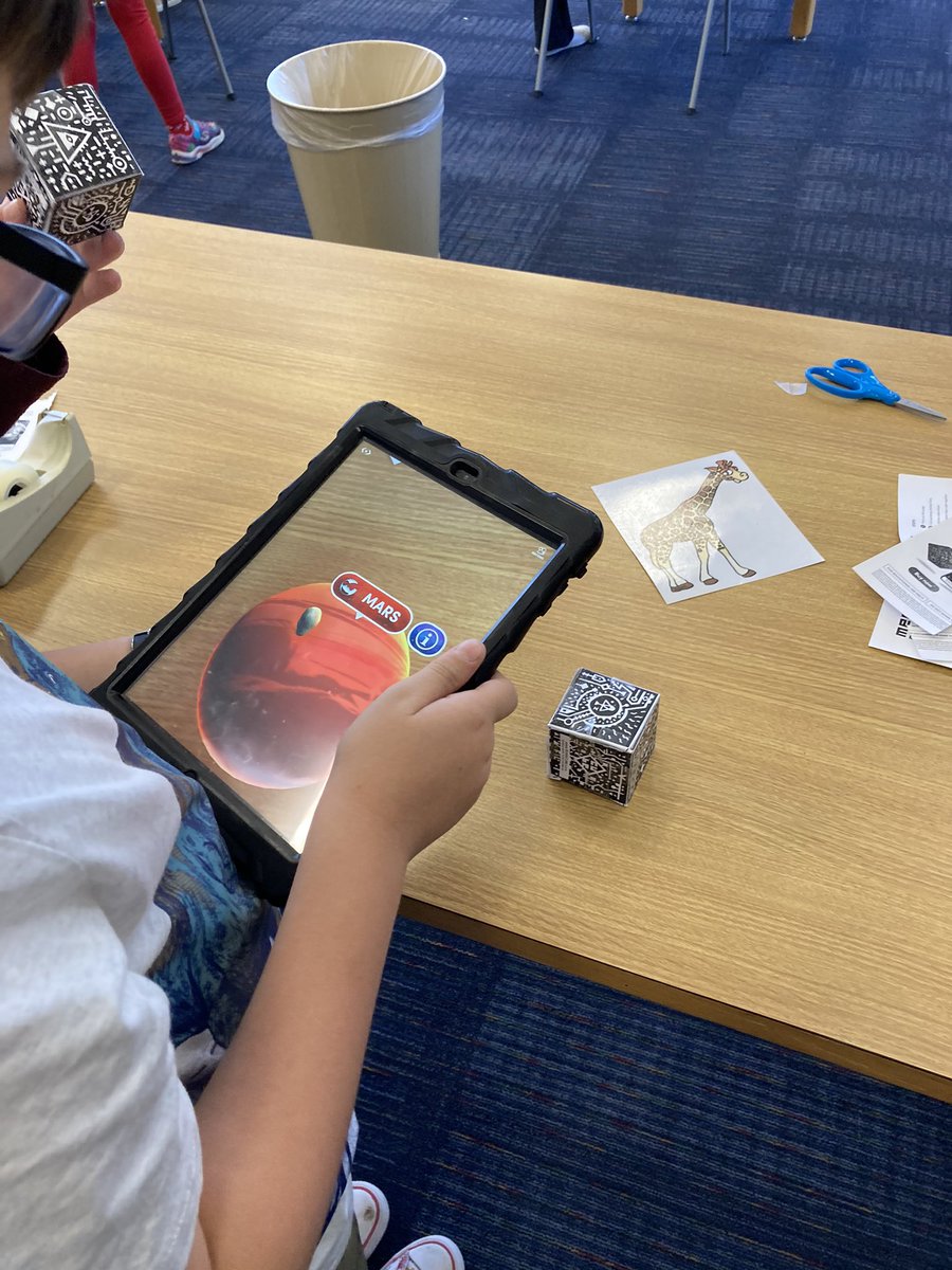 HydeCommons's tweet photo. It was a ton of fun introducing our 3rd graders to the merge cube and watching them learn about the solar system in a whole new way!  Thank you @shannonmmiller for your Merge Cube template tip you shared in your blog. @HydeElementary @CCISDLibrary #ccisdlibs #mergecube https://t.co/4B9GVcQGIM