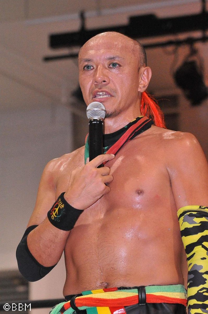 Genki Horiguchi- HAGE- that means baldness- he embraces it- one of his main finishers is a backslide- there's backslide from HEAVEN and HELL- does the booking- HIS MIND!!!!!!- actually goth king- we all love genki here- has the best chant- never ending hage dream