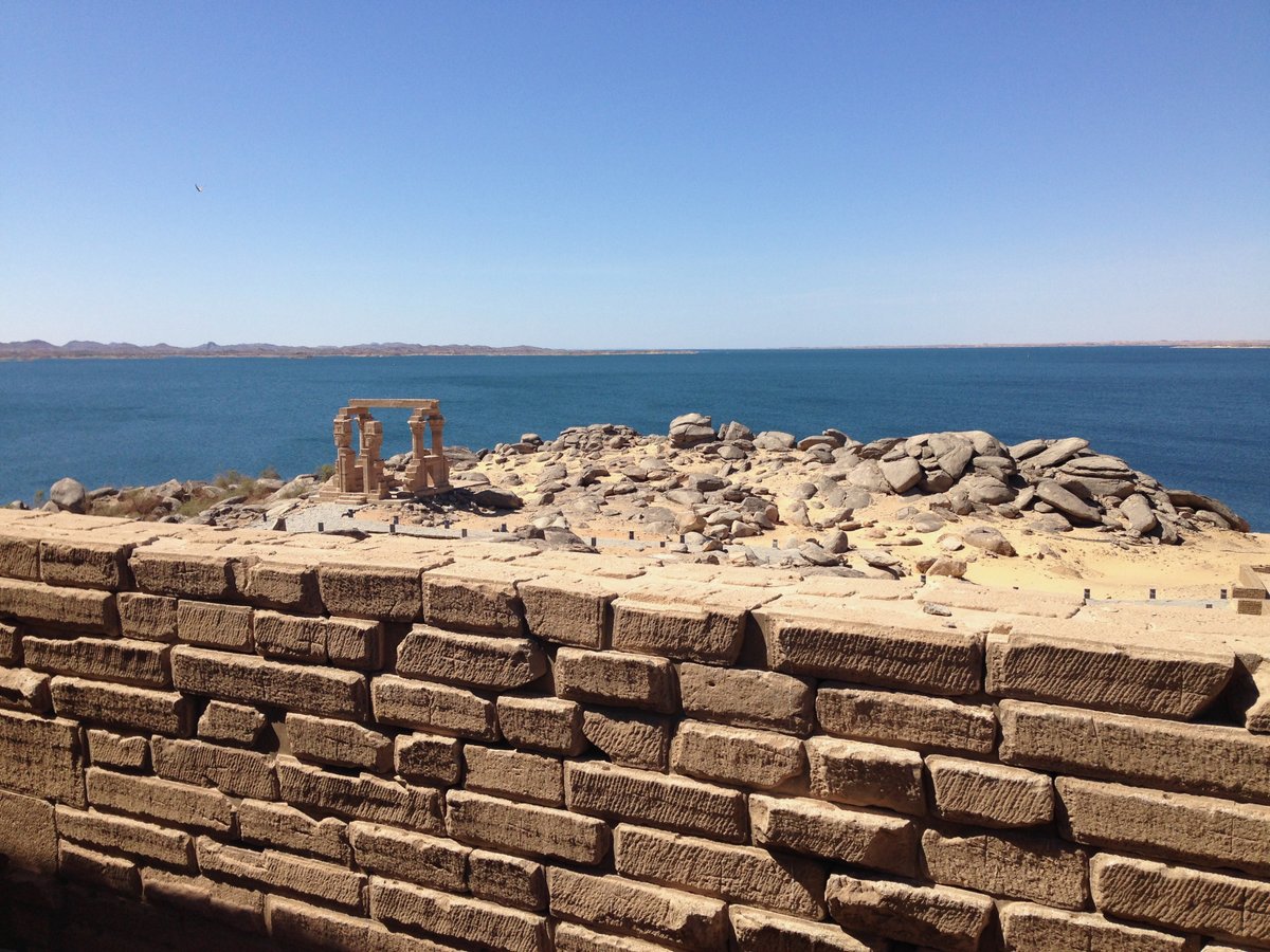 ManonYSchutz's tweet photo. If you're ever in #Aswan, #Egypt, you should also visit the Temple of #Kalabsha. After the construction of the Aswan High Dam, the temple—with several other monuments—was moved to the island on which it stands today, just South of the dam. Cat for scale (and cuteness factor)! https://t.co/l5z38fcHzb