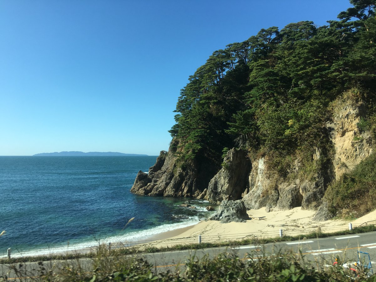 And I do mean up the coast: after a brief section on the plains north of Niigata, the Uetsu Main Line hugs the coast, with beautiful coves, cypress-covered outcroppings, and the deep blue sea.(Taking photographs of this is, as usual from trains, difficult!)